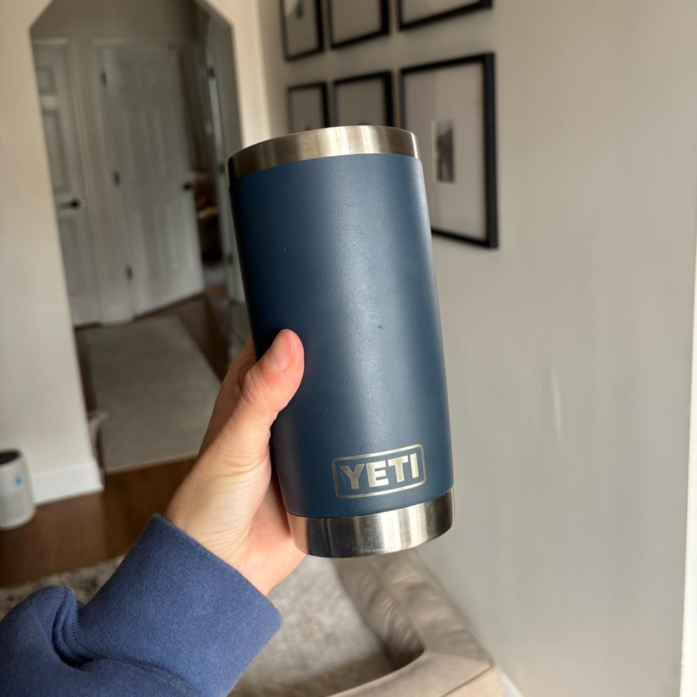 Yeti tumbler cup navy 20 oz tumbler sticker on it